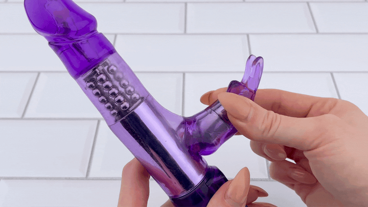 GIF pf neck from Petite Rotating Rabbit Vibrator being bent to show flexibility 