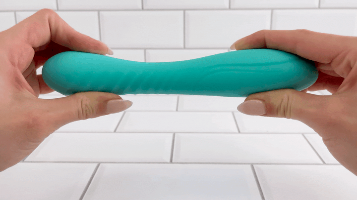 GIF of Luxury 10-Function Flexi G-Spot Vibrator being bent to demonstrate flexibility 