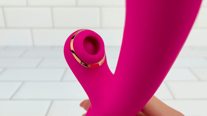 GIF close up of air pulse from, Pinpoint G-Spot Rotating Clit Suction Dual Action Vibrator in full motion 