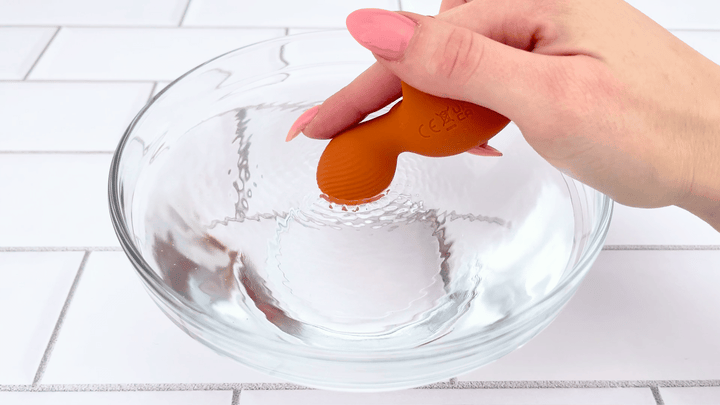 GIF of Finger Vibrator vibrating in bowl of water 