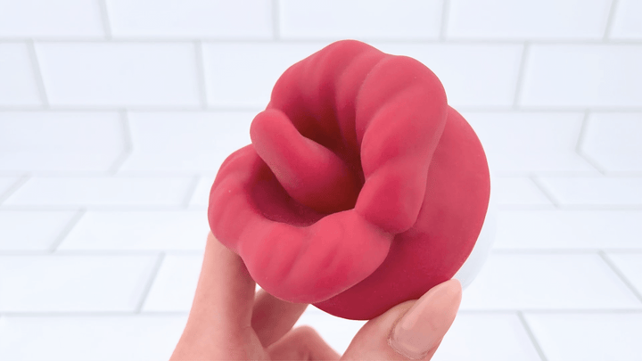 GIF of Flaming Red Lips Self-Motion Flickering Tongue Clit Stimulator on lower setting 