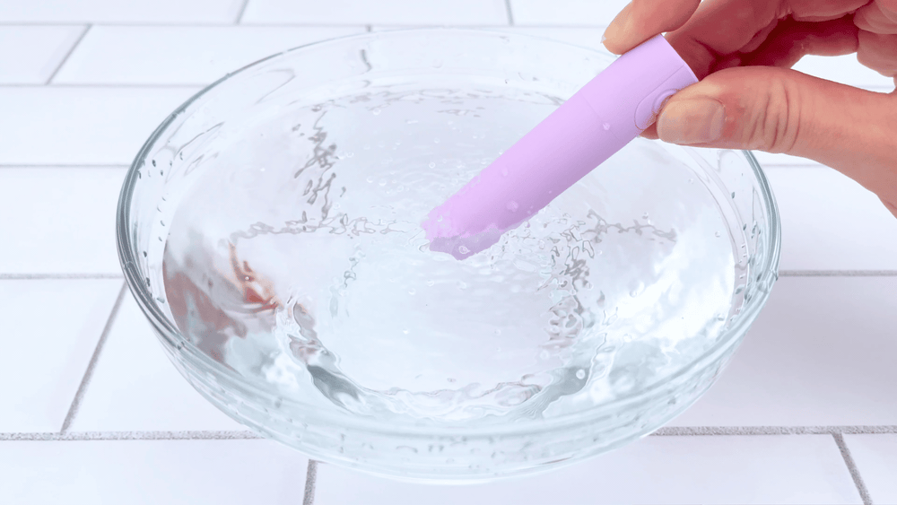 GIF of Discreet Travel-Sized Bullet Vibrator tip vibrating in water 