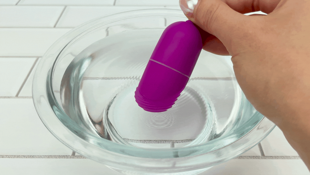GIF of Wireless Remote Vibrating Power Egg vibrating in bowl of water 