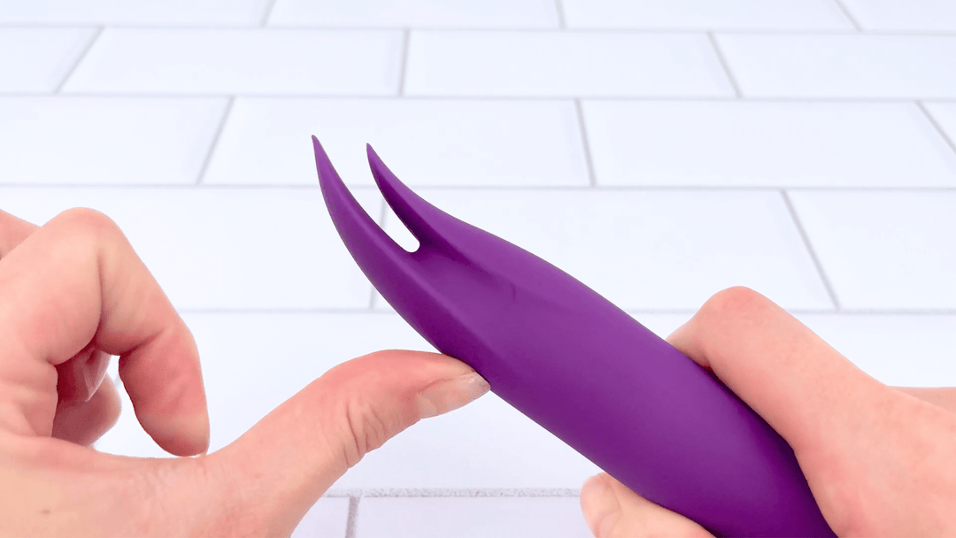 GIF of thumb brushing against tongues from Double Tongue Vibrator 