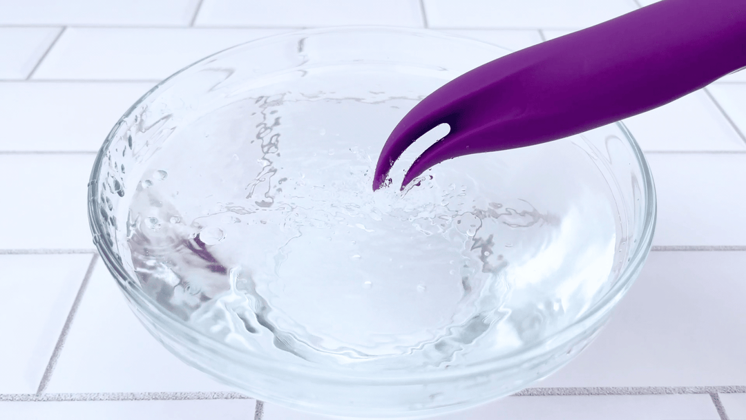 GIF of Double Tongue Vibrator flickering in bowl of water 