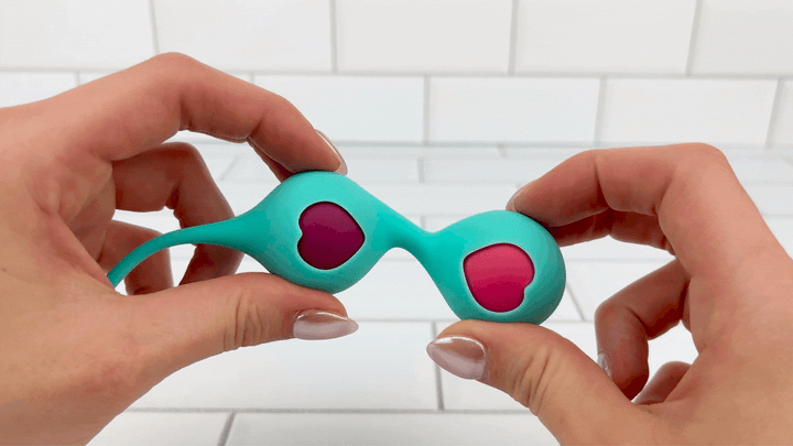 GIF of SORA Combination Duo Tone Kegel Ball and Pleasure Ball Exerciser Set neck being bent to show flexibility 