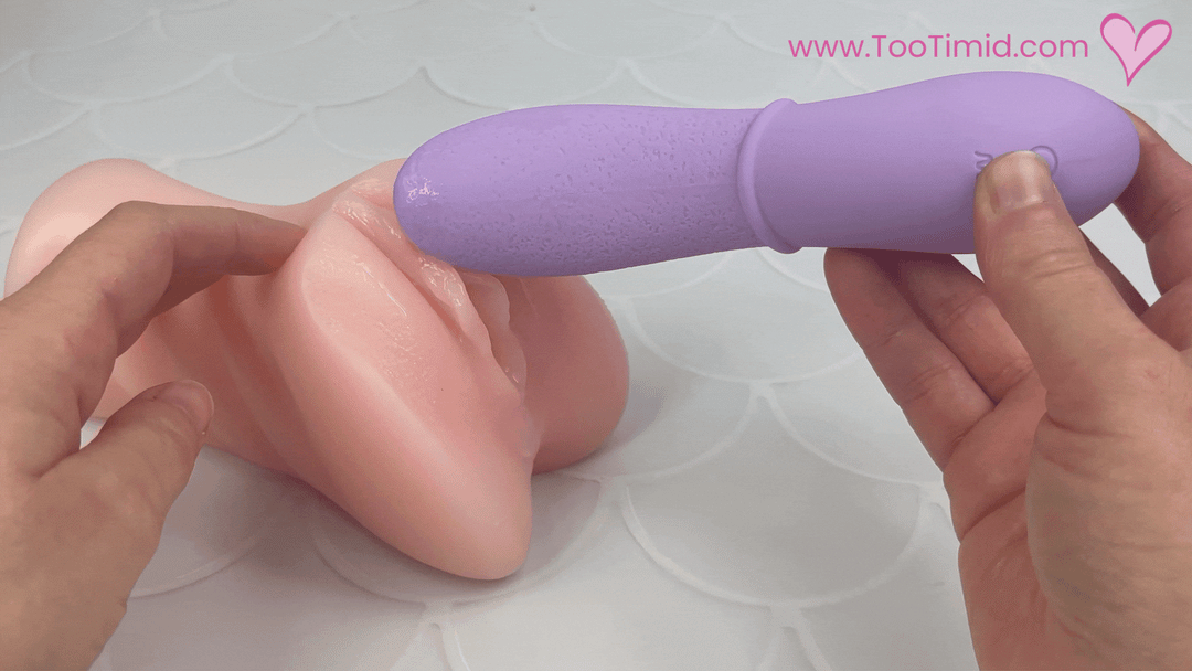 GIF of purple vibrating tongue on clitoris