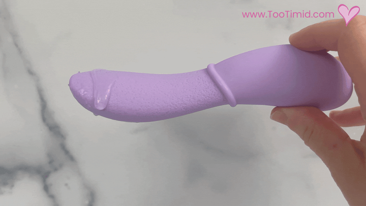 GIF of purple vibrating tongue virbating