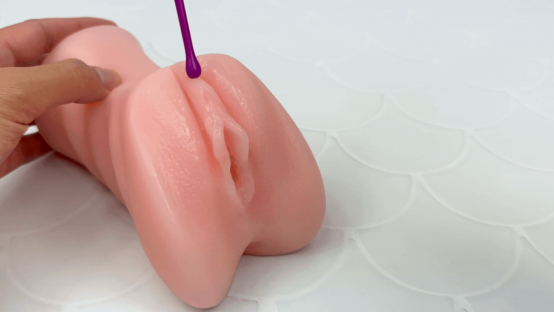 GIF of pinpoint vibe being used on a model of a clitoris