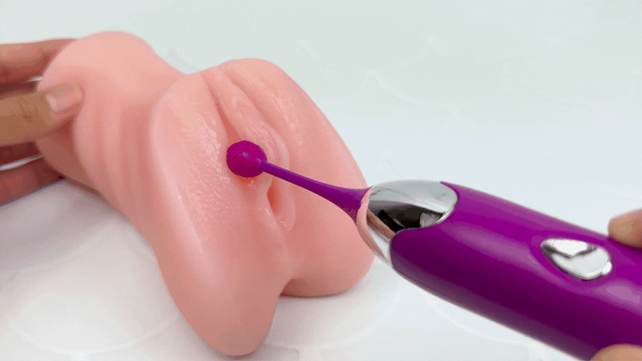 GIF of pinpoint vibe being used on a model of a vagina