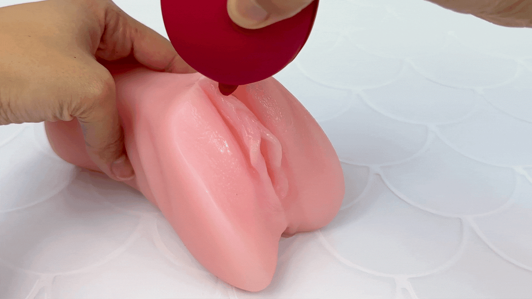 GIF of tongue-end fluttering on a model of a clitoris