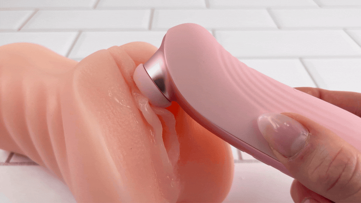 GIF of air pulse toy sucking clit from realistic male masturbator 