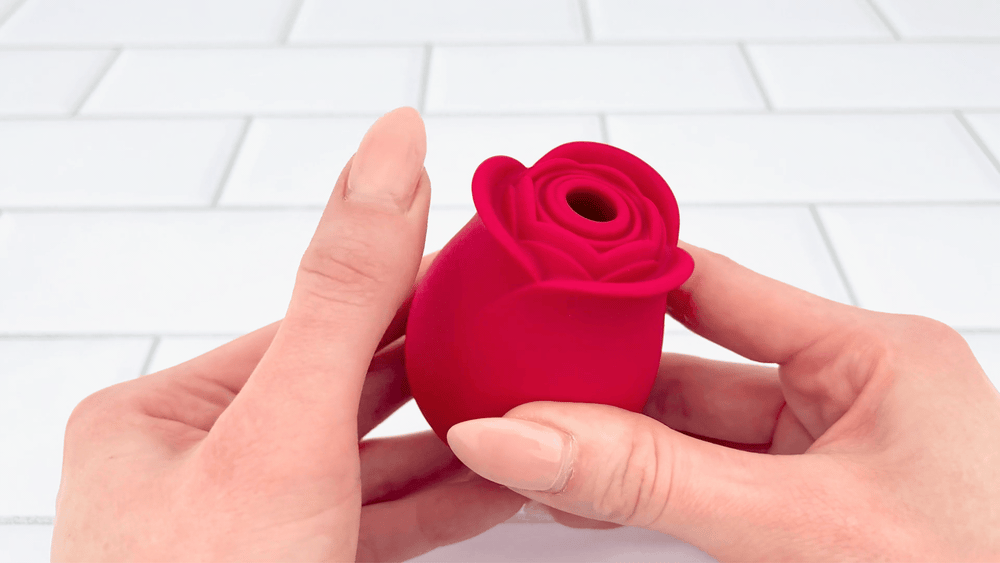 GIF of petals from Euphoria number 1 Selling Rose Sex Toy Air Pulse Stimulator in bowl of water  