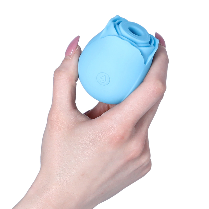 hand holding Rose Sex Toy Air Pulse Stimulator 