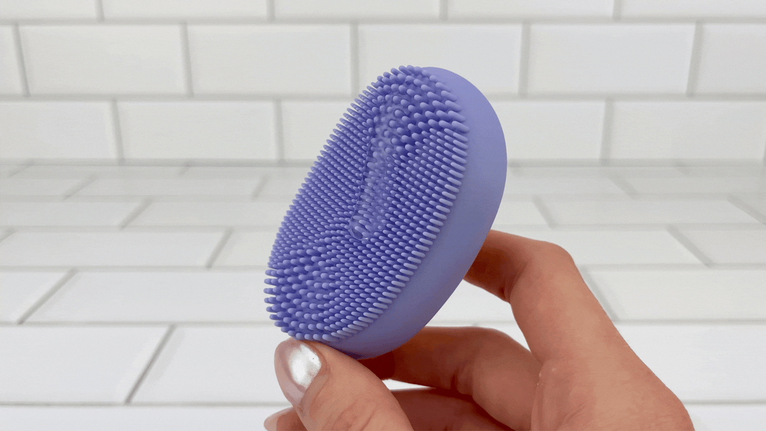 GIF of lube dripping down vibrating Discreet Nubby Massager by TooTimid