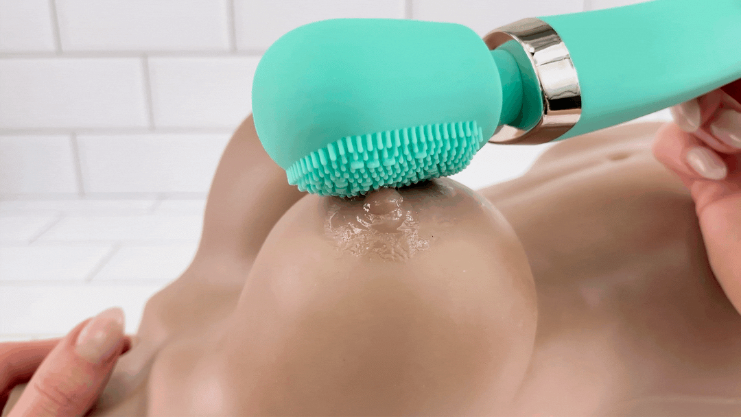 GIF of GIF of STRONG Cordless Body Massage Wand being used on realistic sex doll on nipple