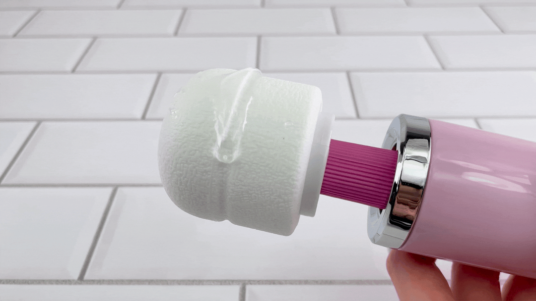 GIF of plug -in Desire Rechargeable Massage Wand on fast speed with lube
