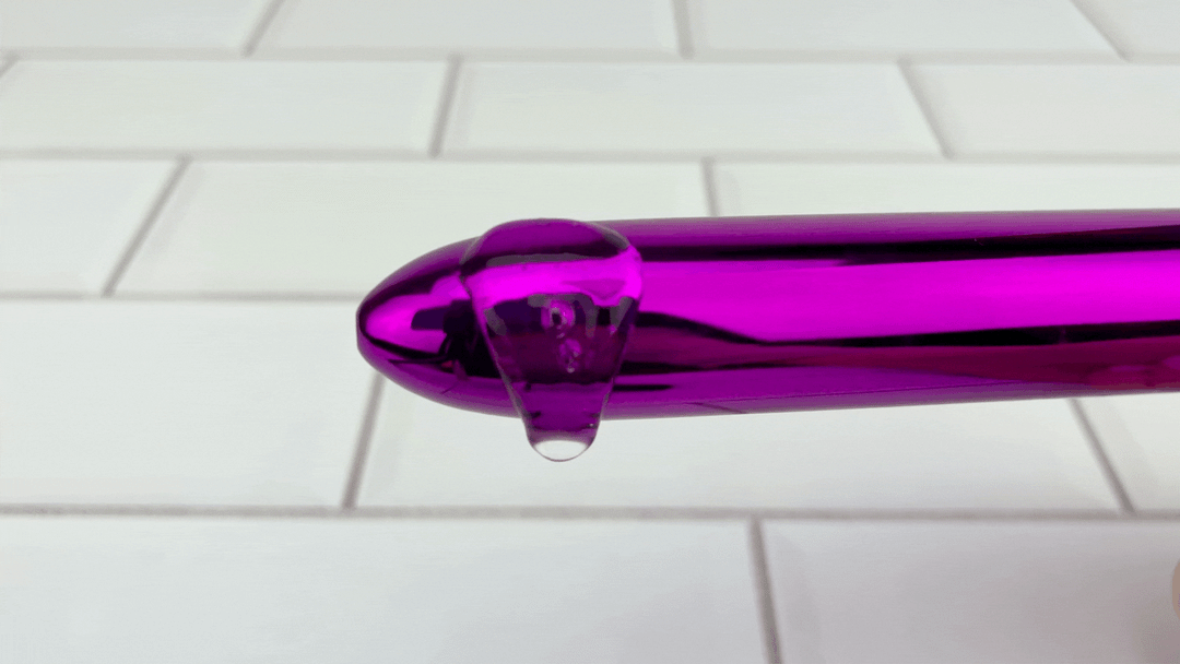 GIF of lube slowly vibrating on Sleek Pinpoint Vibrator 