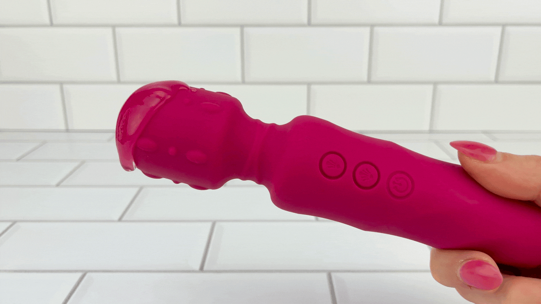 GIF of lube dripping off of vibrating Textured Wand Massager 
