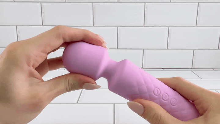 GIF of Lust Silicone Rechargeable Wand neck being bent to show flexibility 