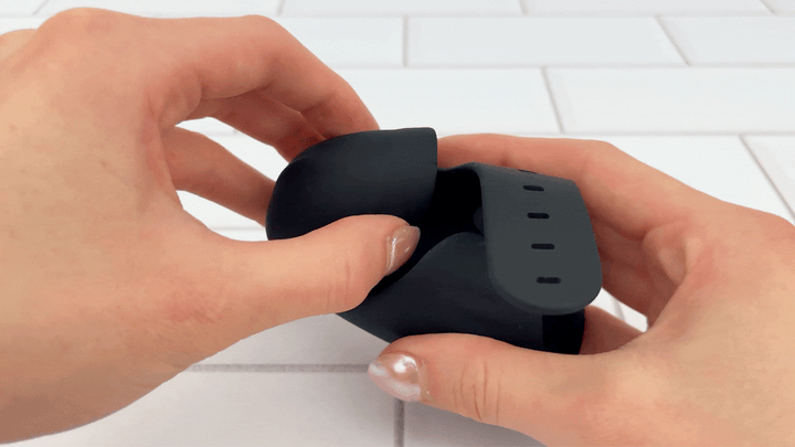 GIF of Wearable Hands-Free Vibrating Masturbator tip being bent to show flexibility 