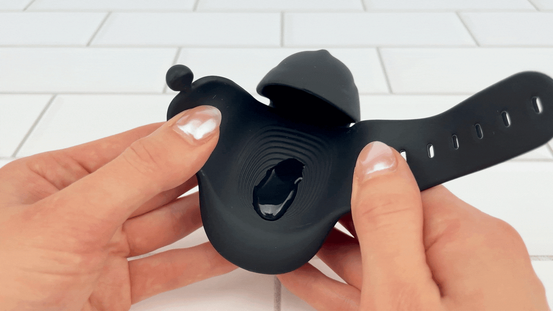 GIF of lubricant vibrating Wearable Hands-Free Vibrating Masturbator on high speed 