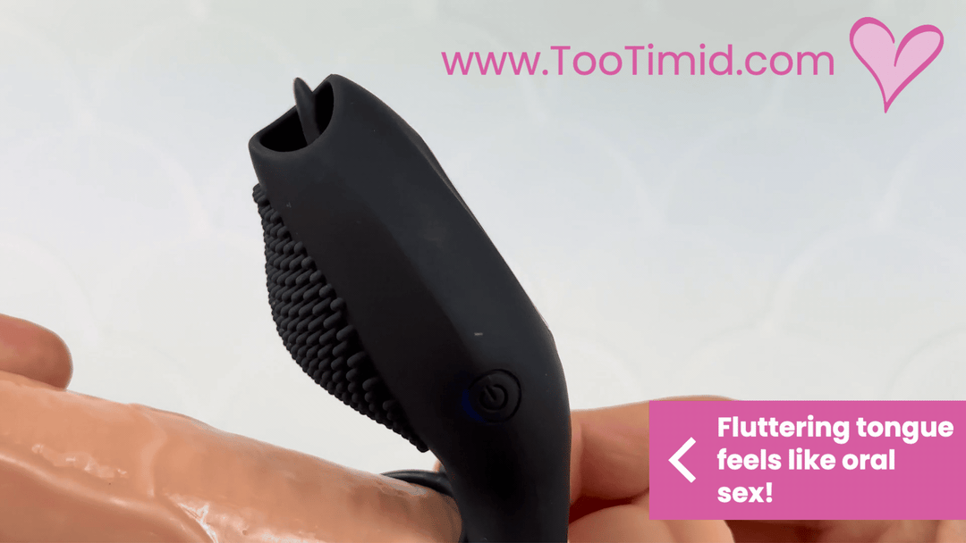 GIF of black vibrating cock ring with clitoral teaser and tongue showing tongue fluttering