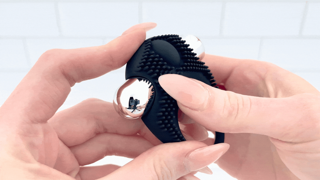 GIF of Silicone Vibrating Cock Ring with Raised Ticklers being brushed against 