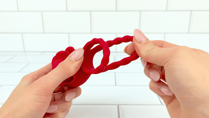 GIF of ball loop being stretched from Twirling Tongue Flower Silicone C-Ring