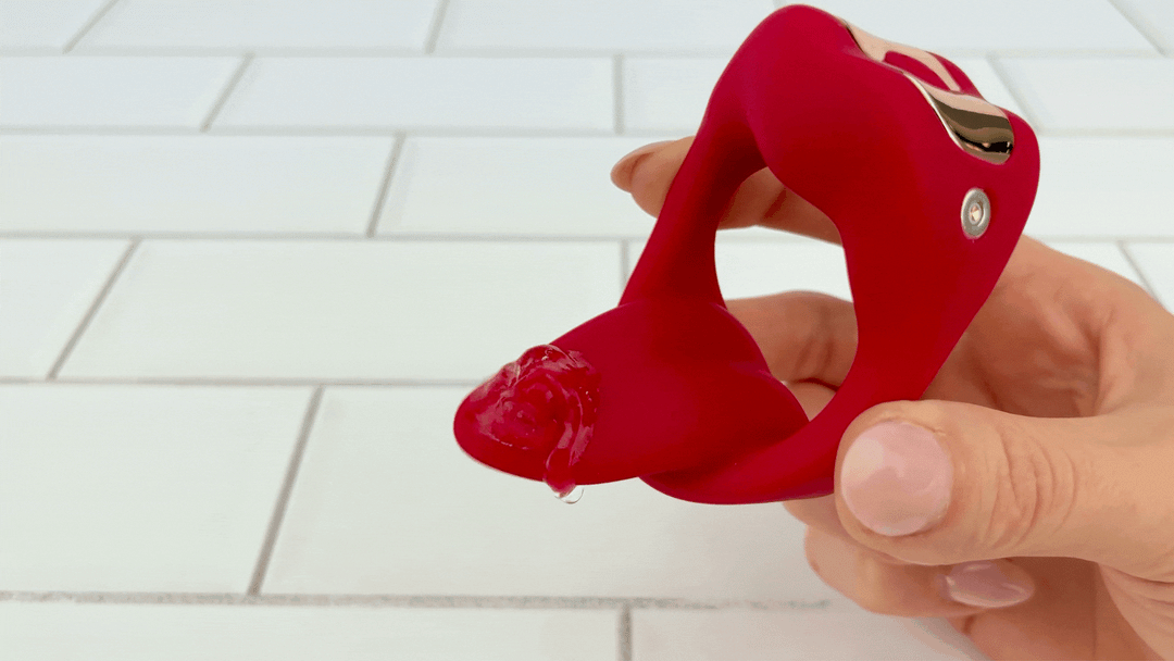 GIF of Vibrating Mouth Cock Ring with lube vibrating on tip of tongue 