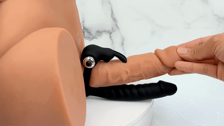 GIF of DP cock ring on a model of a male shaft