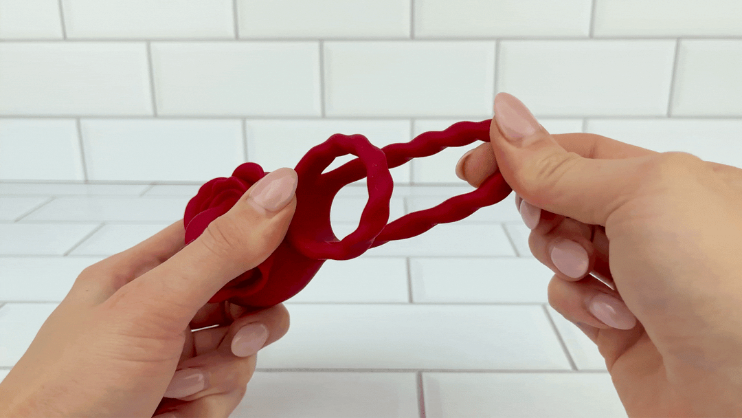 Tongue Rotation Vibration Cock Ring ball loop being pulled 