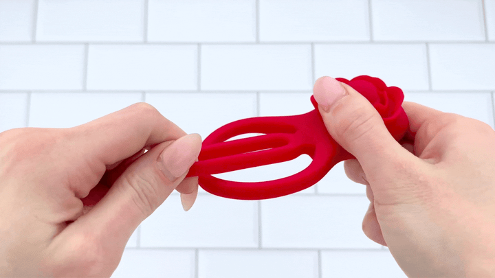 GIF of Flower Double C-Ring inner ring being pulled to show flexibility 