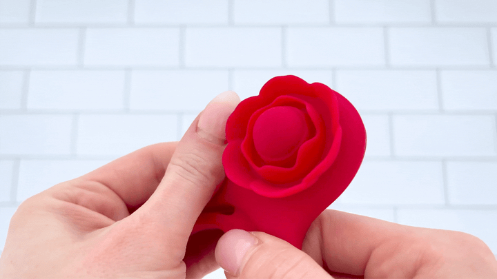 GIF of petals being brushed against soft petals Flower Double C-Ring