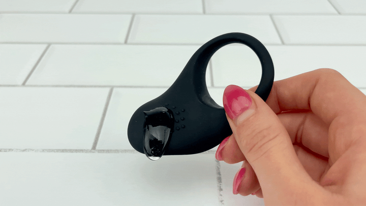 GIF of lubricant dripping off of vibrating Vibrating Teasing Cock Ring 