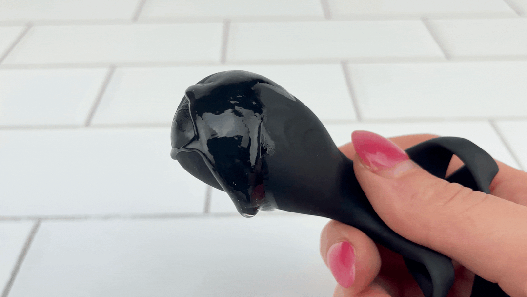 GIF of lubricant on vibrating shaft from Double Cock Ring with Taint/Clit Stimulator  