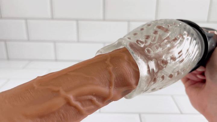 GIF of THRILLER male rose being used on dildo 