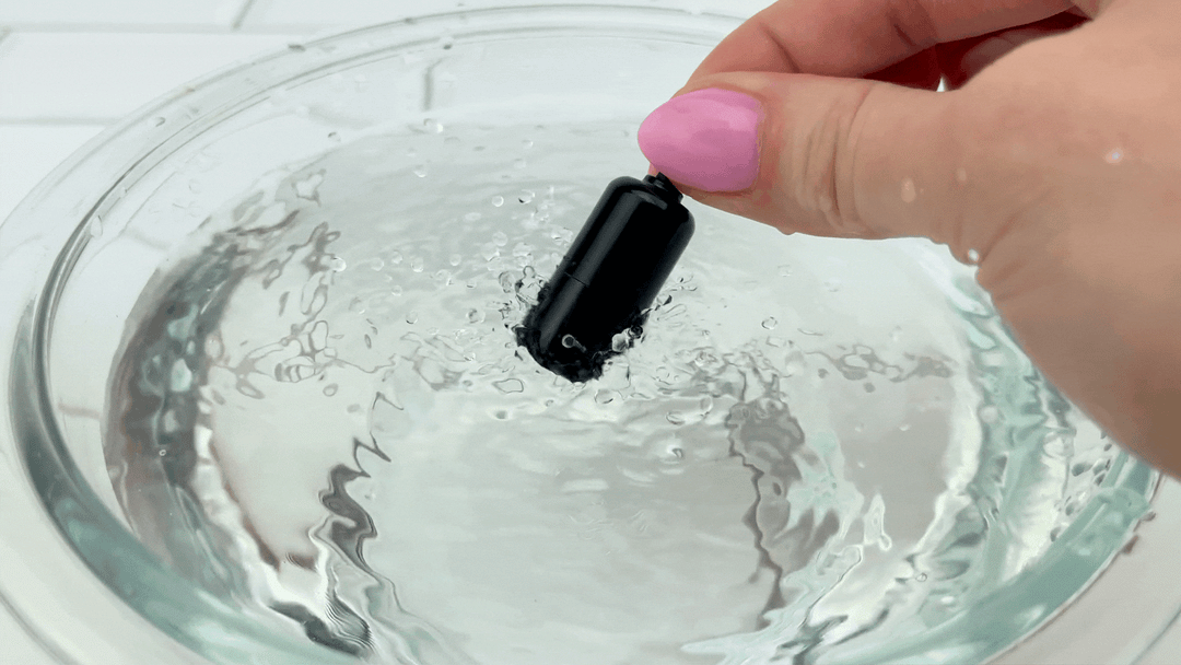 GIF of Bello Male Vibrating Masturbator bullet vibrating intensely in bowl of water 