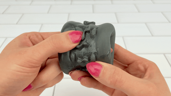 GIF of pleasure nubs from Labio BJ Stroking Aide being brushed with thumb 