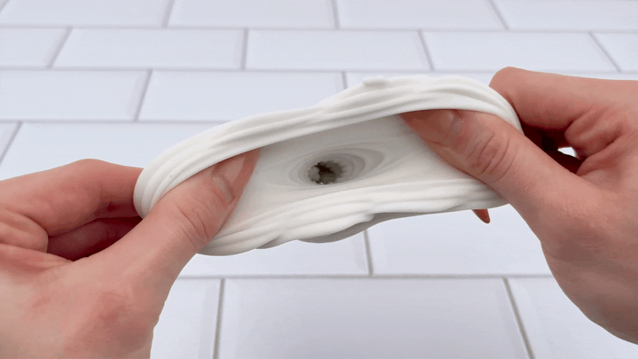 GIF of opening from Jolie Rose Bud Masturbator being stretched open to show pleasure nubs 