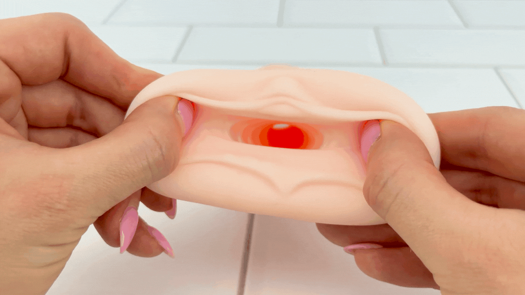 GIF of Fantasy Love Male Stroker entry hole being stretched to show soft material 