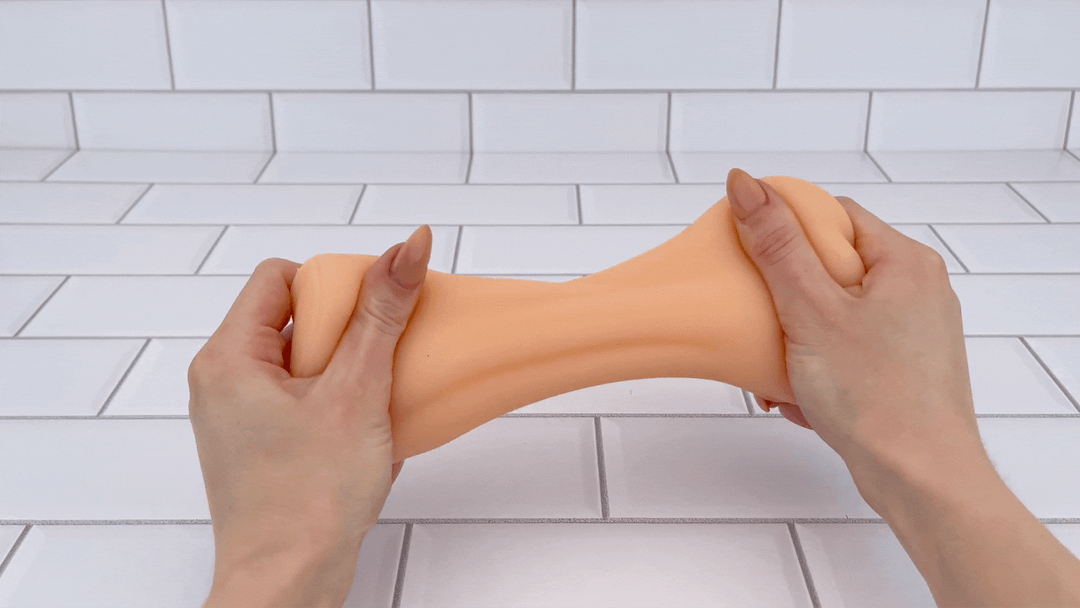 GIF of pocket pussy tube being stretched  