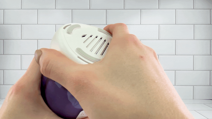 GIF of UV sterilizer lid being removed from Super Series Adjustable Length Masturbator