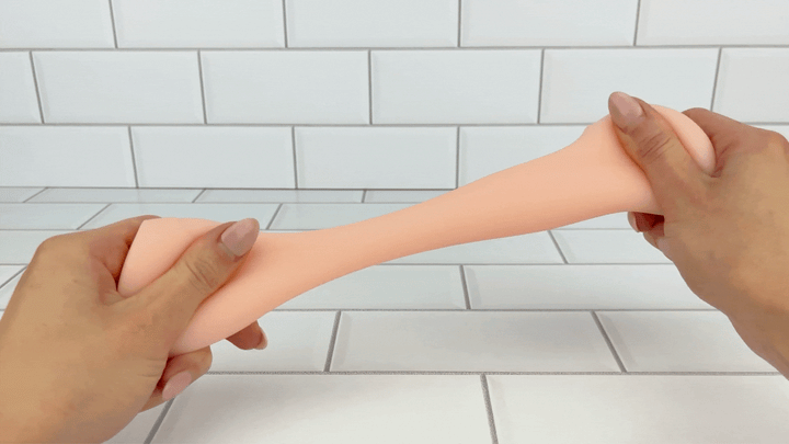 GIF of Realistic Handheld Stroker tub e being stretched 