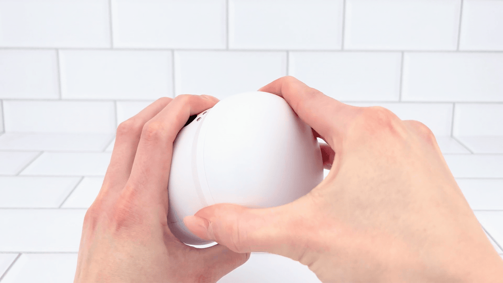 GIF of Open-Ended Vibrating Male Masturbator cap being removed