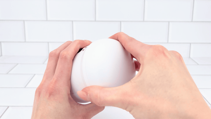 GIF of Open-Ended Vibrating Male Masturbator cap being removed