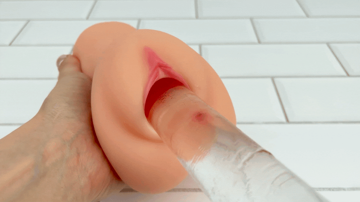 GIF of glass dildo sliding into vagina male sex toy super realistic beige 