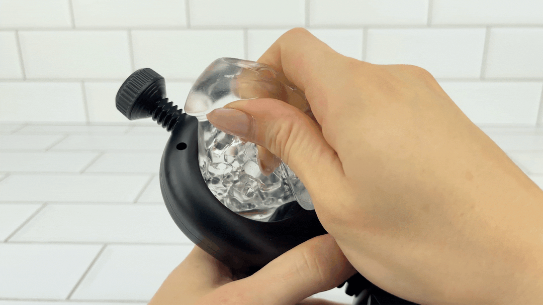GIF of Thrusting Masturbator with Remote and Adjustable Belts pleasure sleeve being removed 