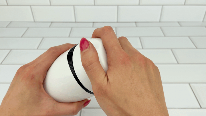 GIF if lid from Turbo Moan Master – suction, vibes & moans, being removed