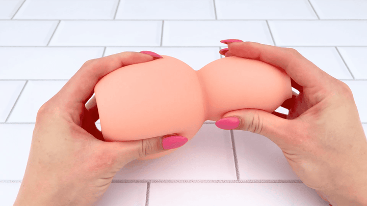 GIF of Ultimate Real Feel Sucking Stroker bring squished 